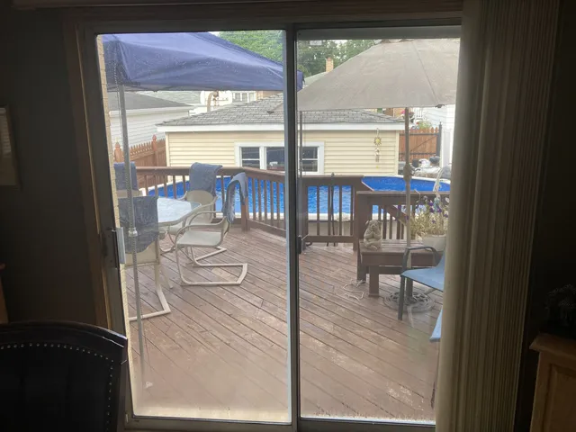 a view of a back yard of the house