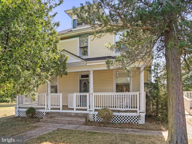 front view of a house with a street