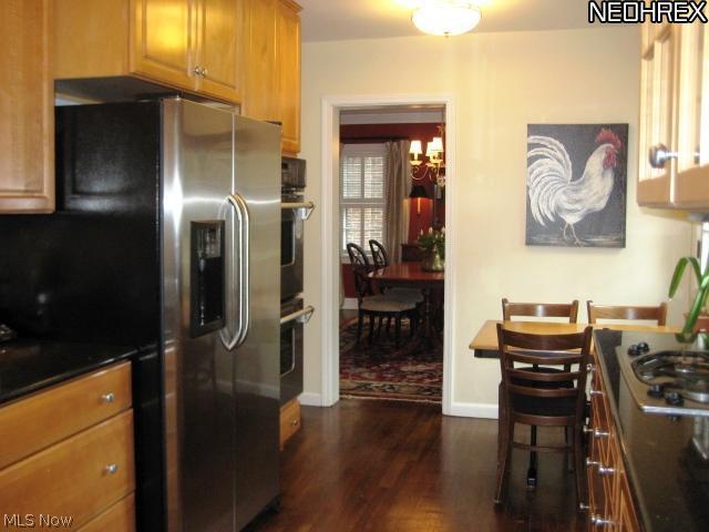 3326 Daleford Road Cleveland, OH 44120 - Photo 12 of 23 View of Dining Room from Kitchen with stainless appliances.