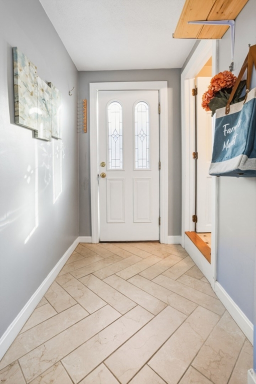 22 Laconia Avenue Saugus, MA 01906 - Photo 17 of 36 a view of empty room with wooden floor and fan