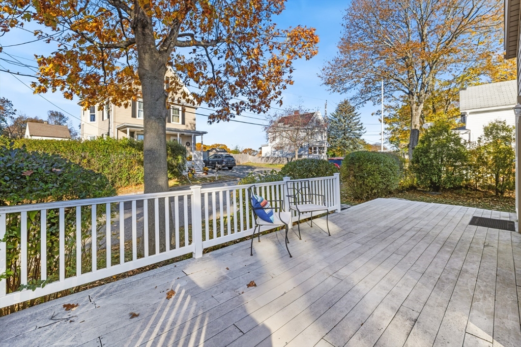 22 Laconia Avenue Saugus, MA 01906 - Photo 26 of 36 a balcony with wooden floor and fence
