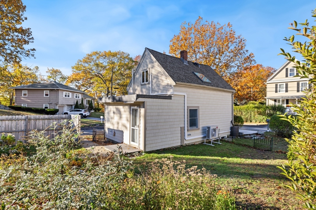 22 Laconia Avenue Saugus, MA 01906 - Photo 30 of 36 a backyard of a house with lots of green space