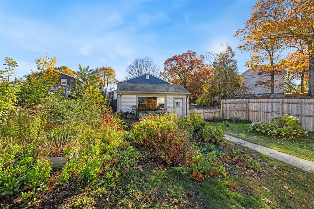 22 Laconia Avenue Saugus, MA 01906 - Photo 31 of 36 a front view of a house with garden