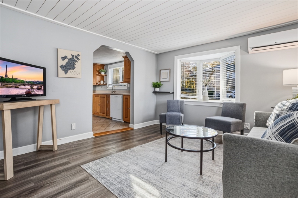 22 Laconia Avenue Saugus, MA 01906 - Photo 4 of 36 a living room with furniture and a flat screen tv