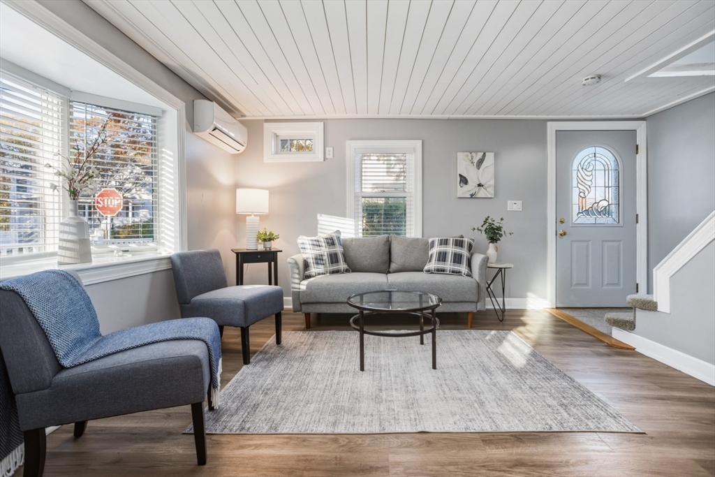 22 Laconia Avenue Saugus, MA 01906 - Photo 6 of 36 a living room with furniture and a large window