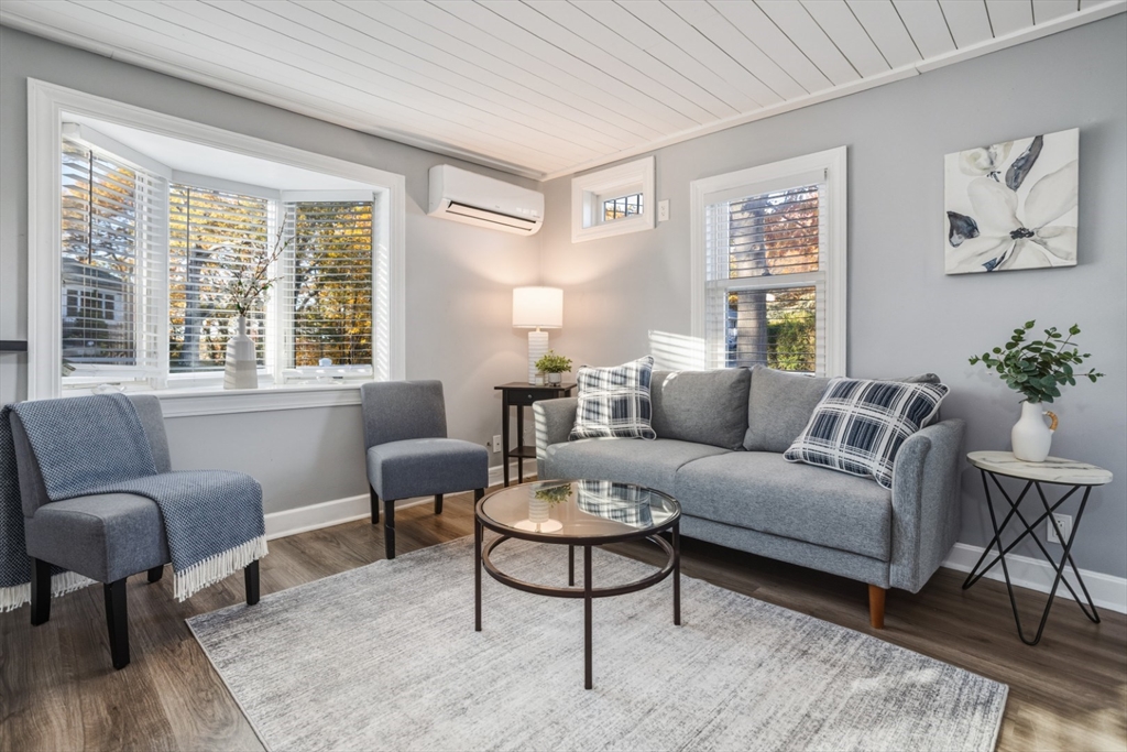22 Laconia Avenue Saugus, MA 01906 - Photo 7 of 36 a living room with furniture and a potted plant