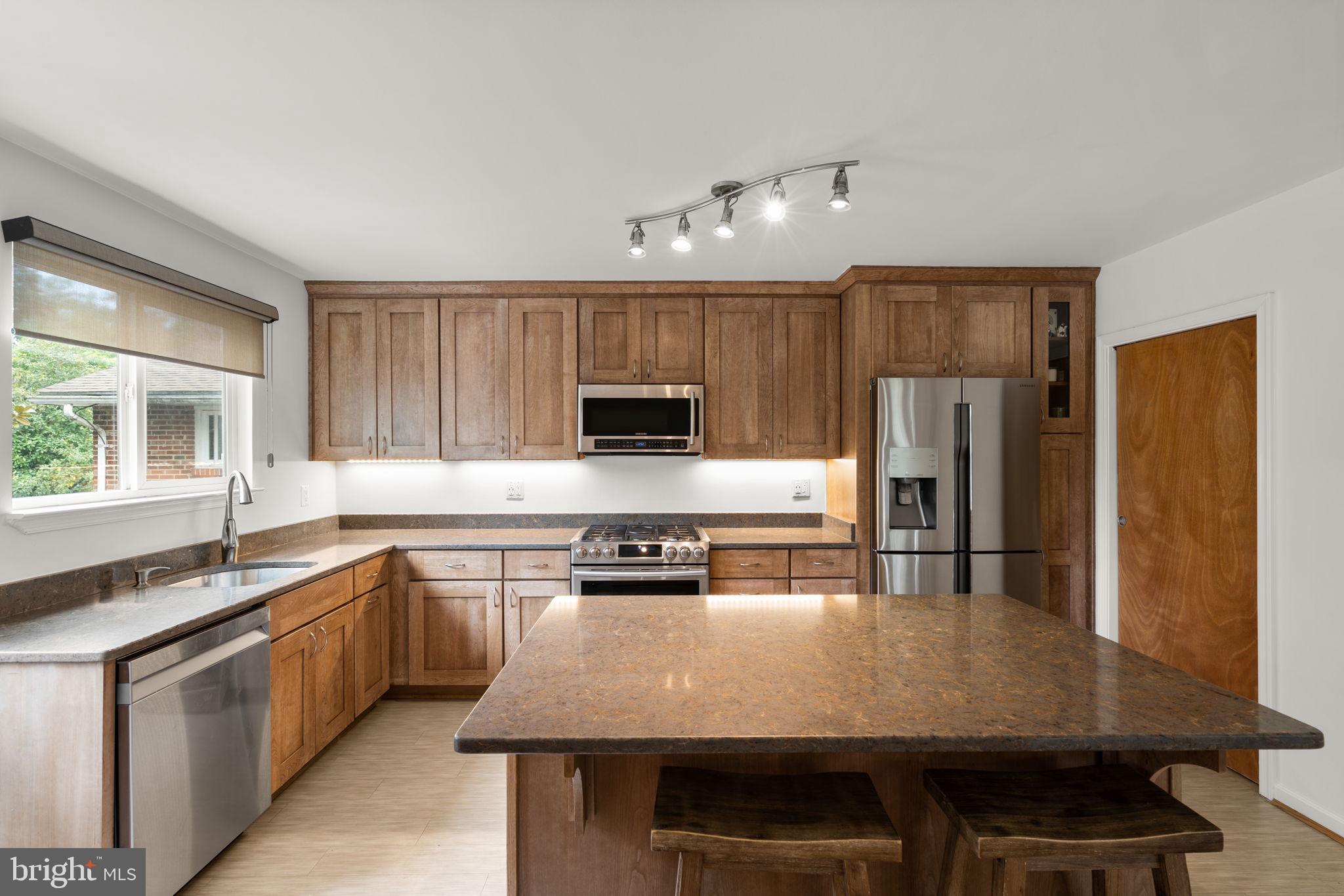 48 Oswego Avenue Silver Spring, MD 20912 - Photo 10 of 32 SS Appliances Recycled Composite Countertops