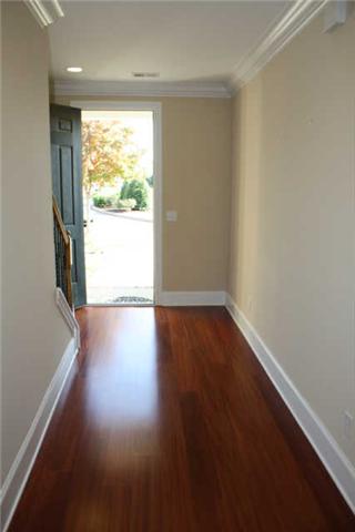 1024 Rochelle Avenue Thompson's Station, TN 37179 - Photo 2 of 20 GENEROUS foyer...to welcome your guests to your stunning home. THIS does not feel like your typical townhome! It is BIG & BRIGHT and finished like a custom home with crown moulding and tall baseboards and 1st class touches,