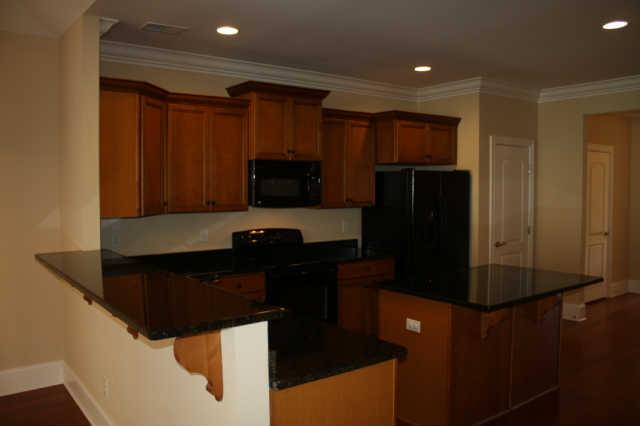 1024 Rochelle Avenue Thompson's Station, TN 37179 - Photo 4 of 20 Breakfast bar adjacent to the dining room is perfect for entertaining!