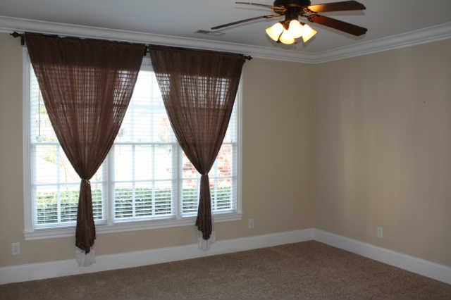 1024 Rochelle Avenue Thompson's Station, TN 37179 - Photo 8 of 20 This large master bedroom gets plenty of light from these 3 windows. And, talk about a closet!!! The his & hers closet is fabulous!!!
