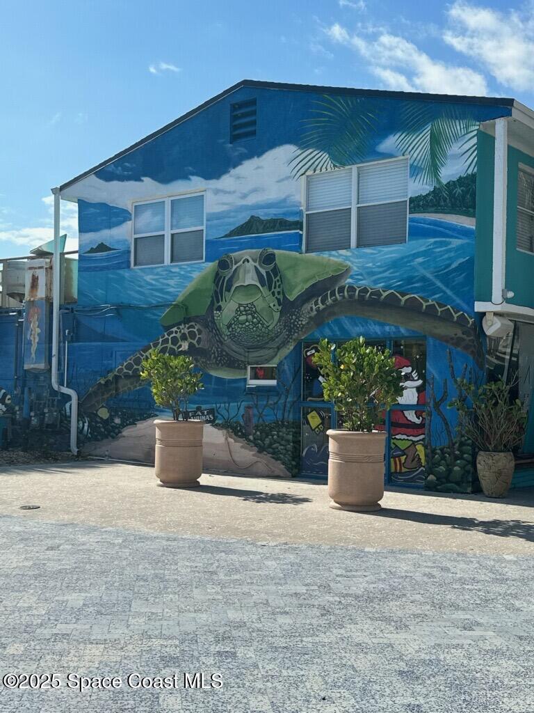 6100 Ridgewood Avenue, Unit 6 Cocoa Beach, FL 32931 - Photo 14 of 15 turtle mural