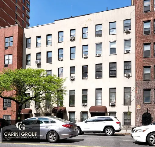 a car parked in front of a building