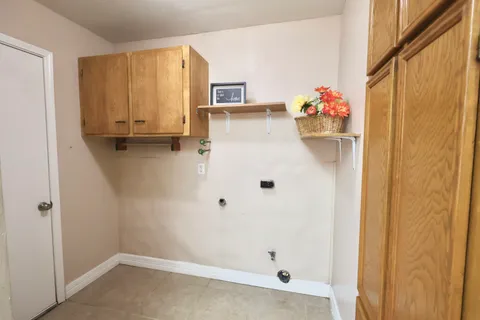 a kitchen with stainless steel appliances a refrigerator and a stove