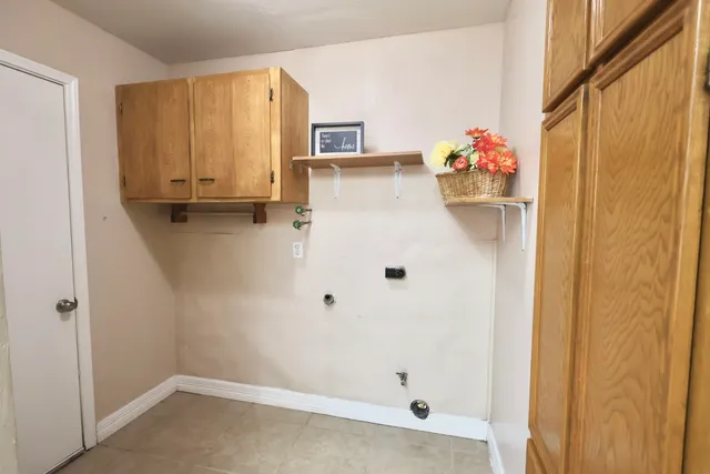 a kitchen with stainless steel appliances a refrigerator and a stove