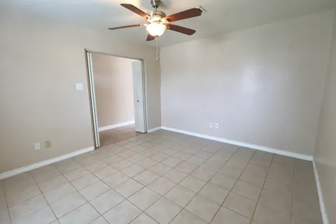 a view of house with yard