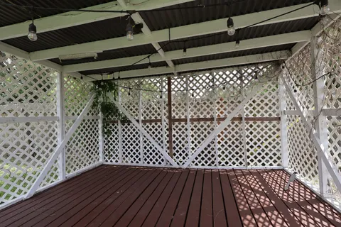 a view of a back yard of the house