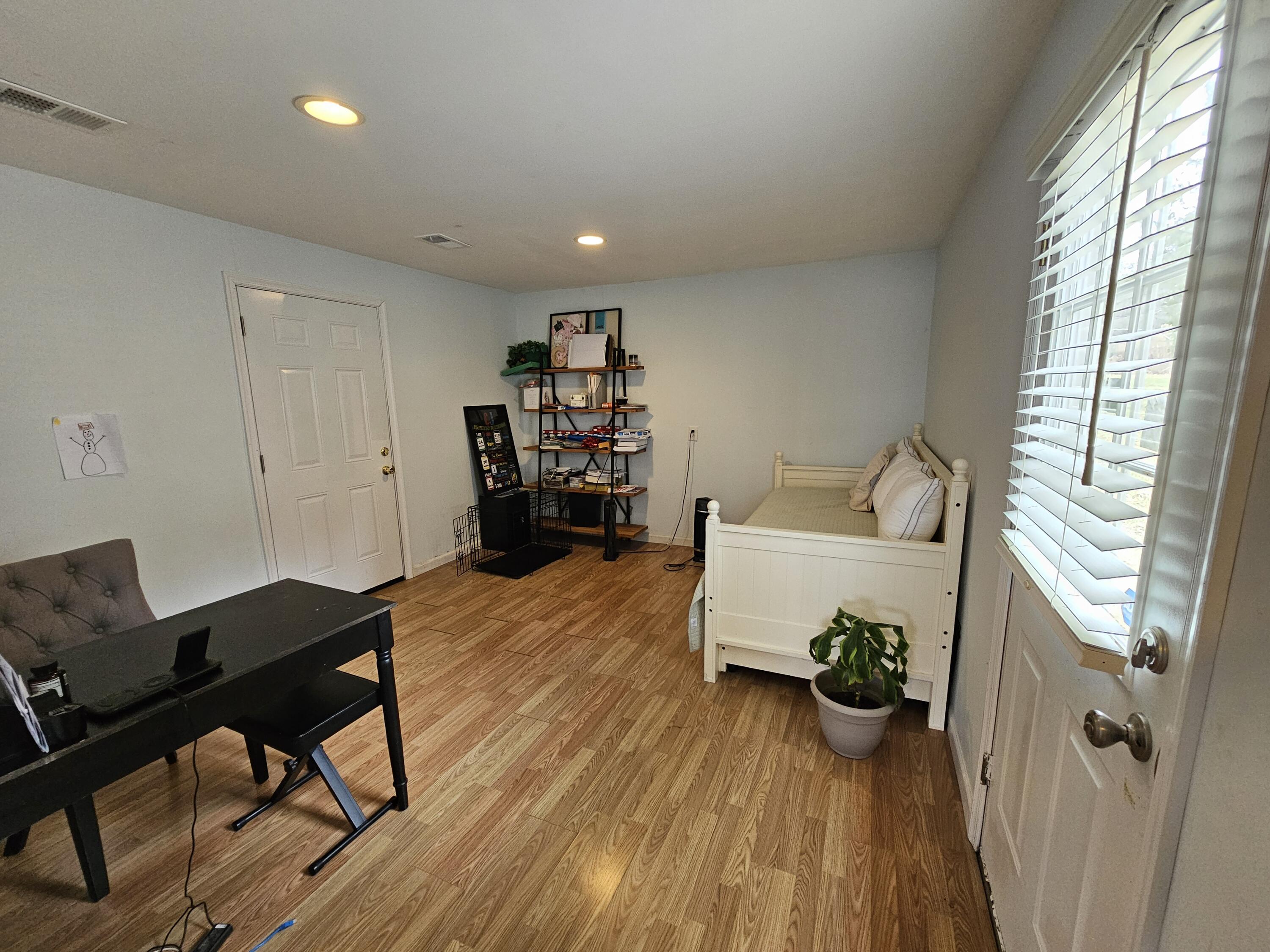 117 Cross Street Pocono Lake, PA 18347 - Photo 13 of 26 a living room with furniture and a wooden floor