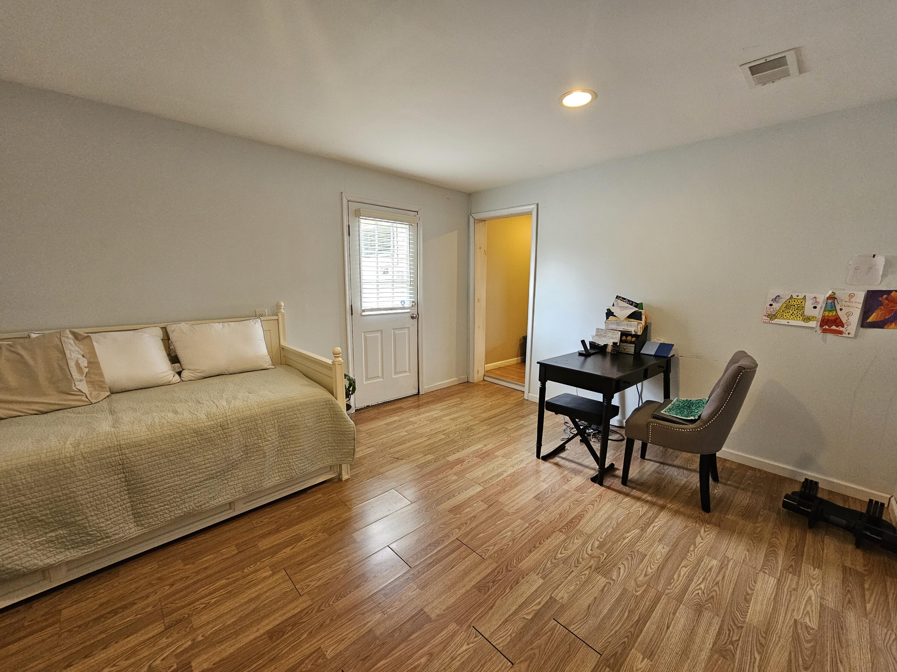 117 Cross Street Pocono Lake, PA 18347 - Photo 15 of 26 a bedroom with a bed and chair