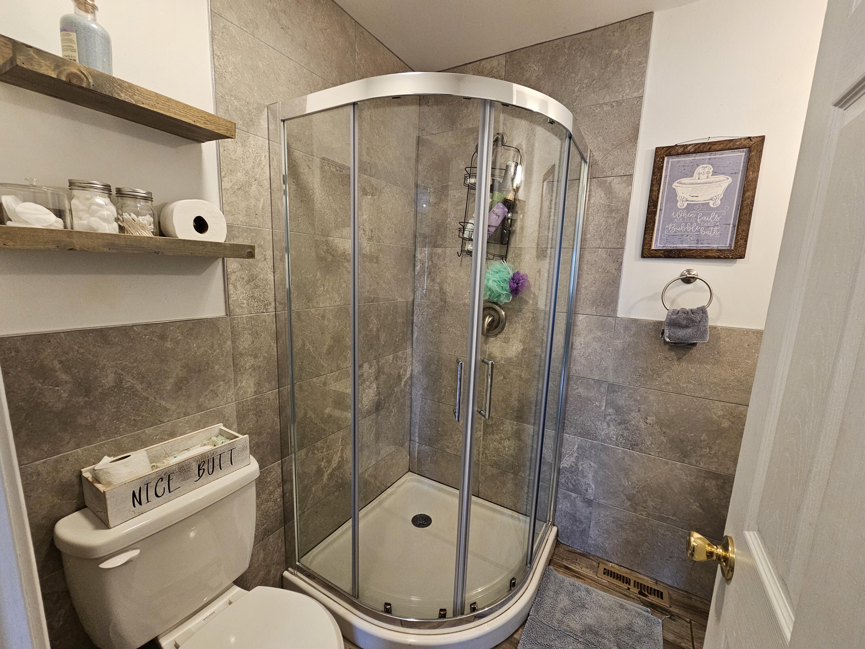 117 Cross Street Pocono Lake, PA 18347 - Photo 19 of 26 a bathroom with a toilet and a shower