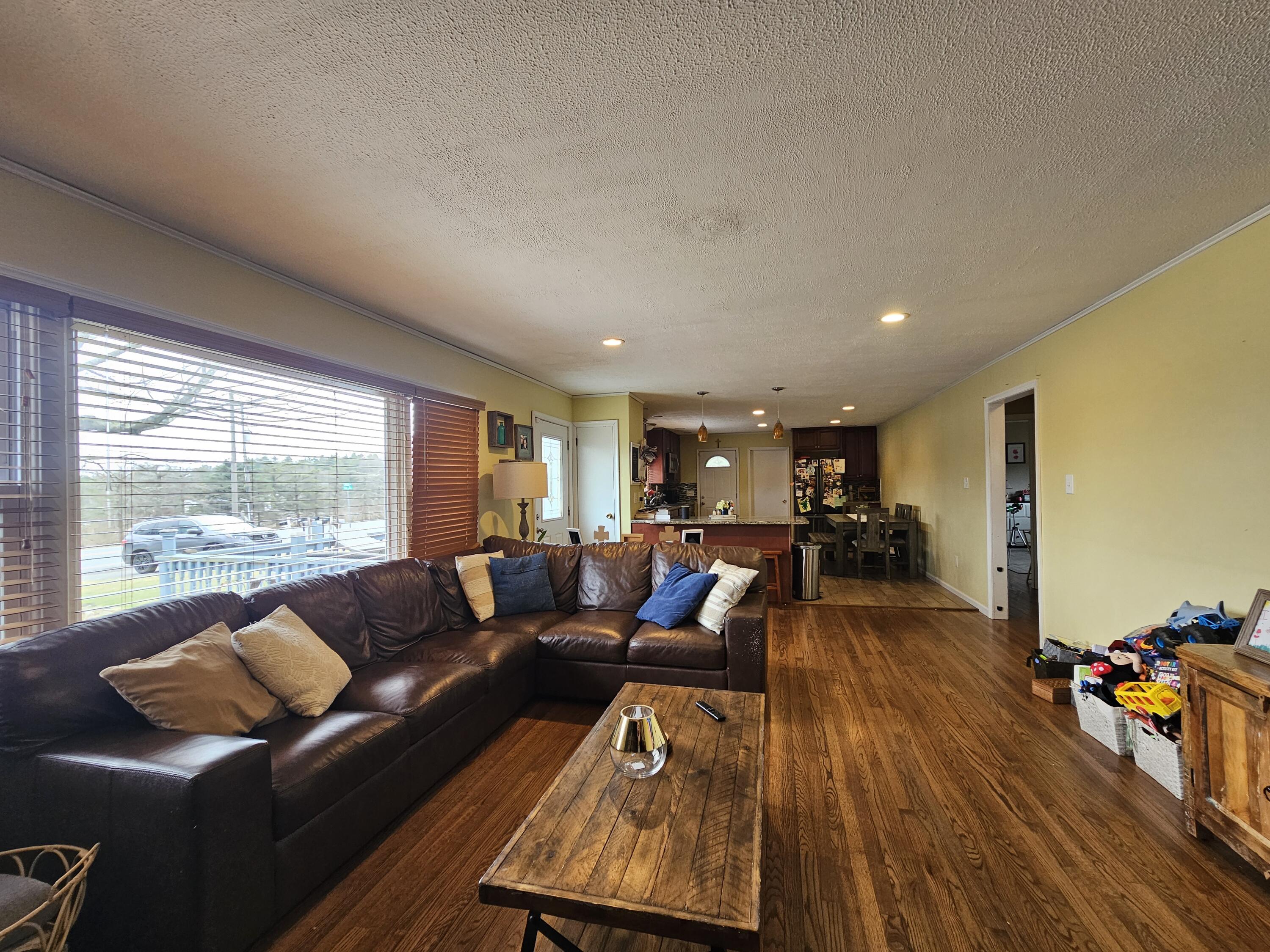 117 Cross Street Pocono Lake, PA 18347 - Photo 7 of 26 a living room with furniture and a large window