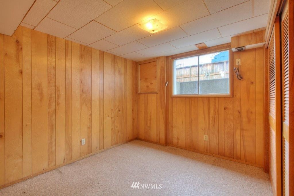 3020 Northwest 75th Street Seattle, WA 98117 - Photo 14 of 22 an empty room with windows