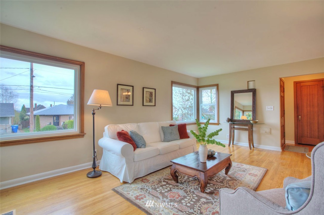 3020 Northwest 75th Street Seattle, WA 98117 - Photo 5 of 22 a living room with furniture and a window