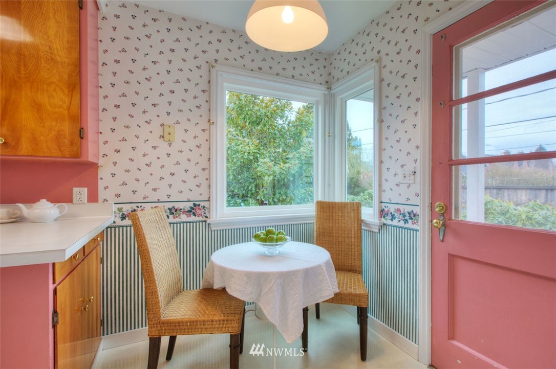 3020 Northwest 75th Street Seattle, WA 98117 - Photo 9 of 22 a view of a dining room with furniture window and outside view