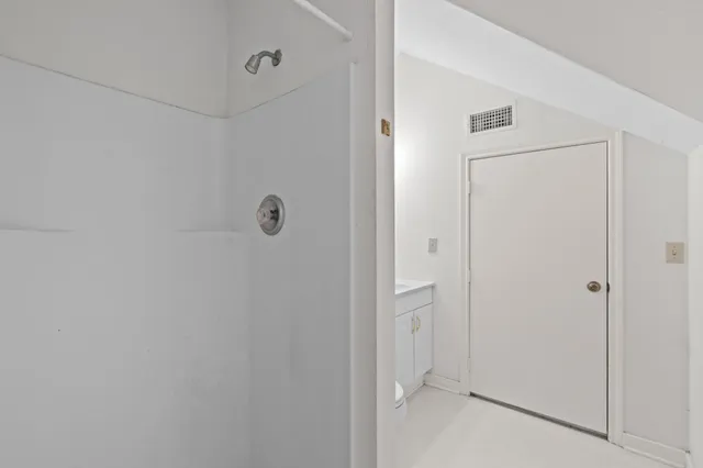 a backyard of a house with outdoor seating