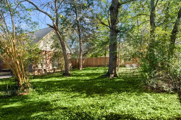a view of a backyard with a garden
