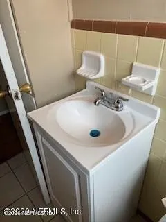 a bathroom with a sink and a toilet