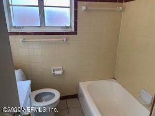 2117 Spring Park Road, Unit 4 Jacksonville, FL 32207 - Photo 3 of 9 a bathroom with a toilet and a sink