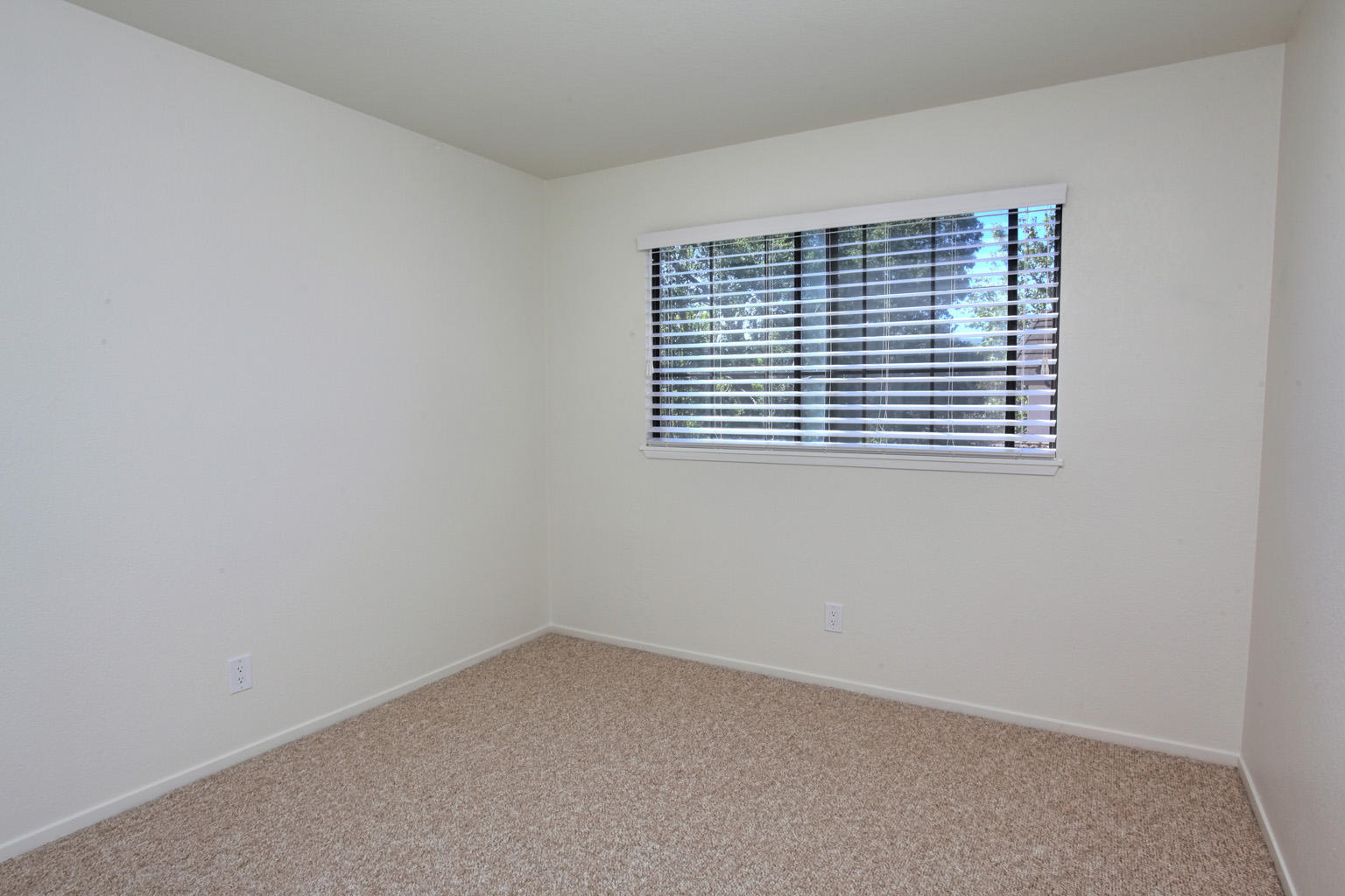 1493 Aarhus Drive, Unit 7 Solvang, CA 93463 - Photo 13 of 24 a view of an empty room with a window