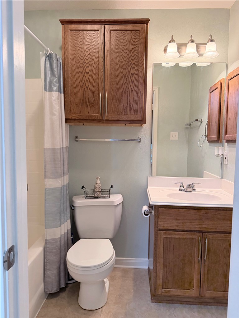 1029 Fallbrook Loop College Station, TX 77845 - Photo 22 of 34 a bathroom with a toilet sink and mirror