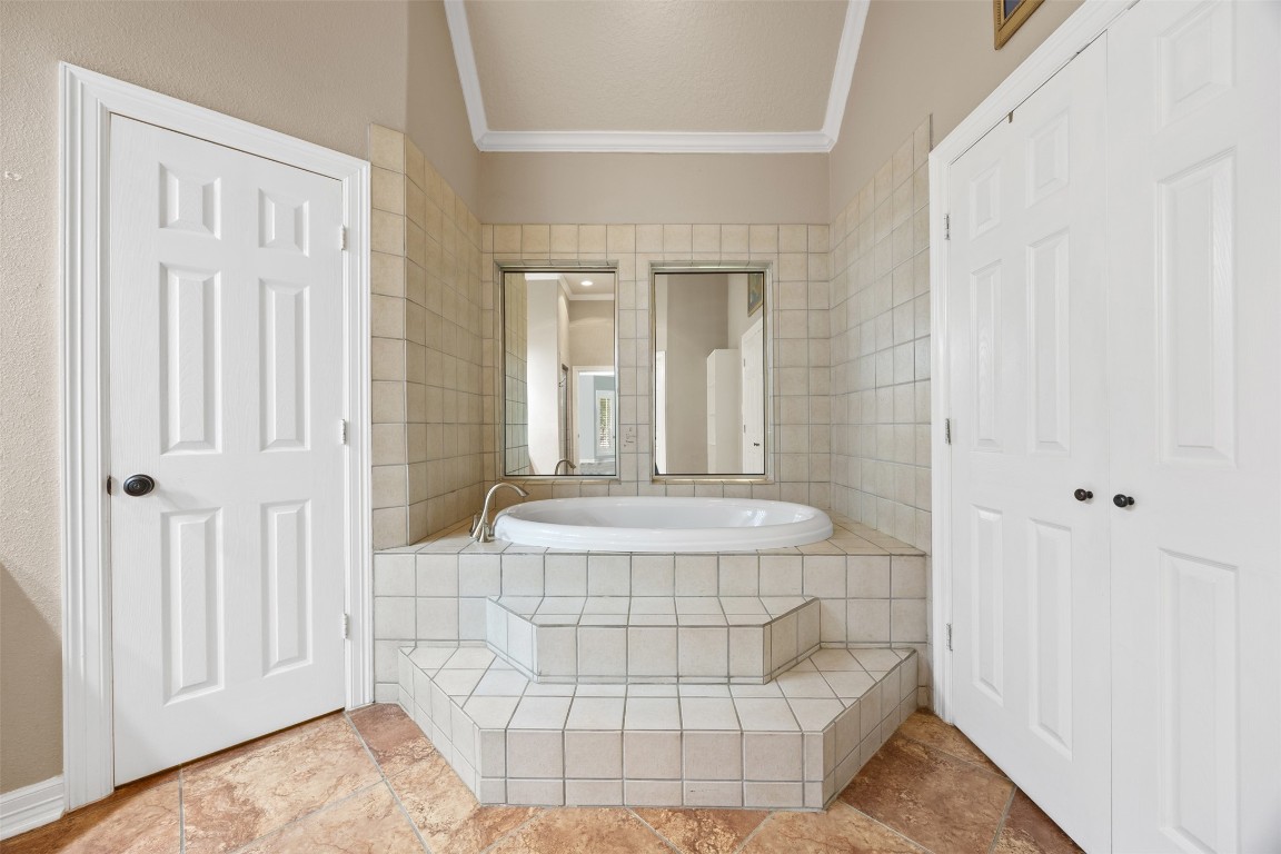 2622 Muegge Road Rosenberg, TX 77471 - Photo 22 of 35 a bathroom with a bathtub and shower