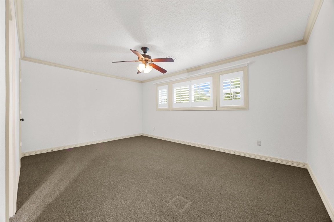 2622 Muegge Road Rosenberg, TX 77471 - Photo 27 of 35 an empty room with a window