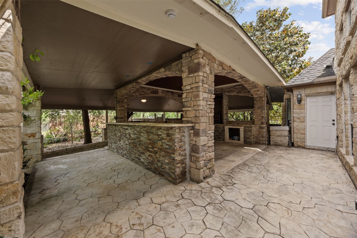 2622 Muegge Road Rosenberg, TX 77471 - Photo 30 of 35 a view of a porch with furniture and a garage