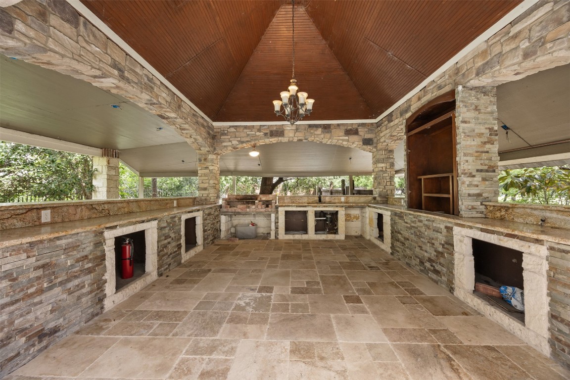 2622 Muegge Road Rosenberg, TX 77471 - Photo 31 of 35 a view of a porch with chairs and a fireplace
