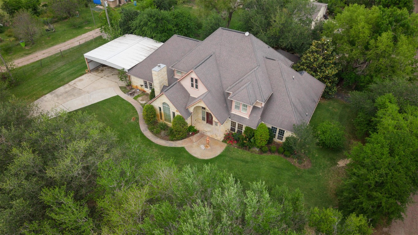 2622 Muegge Road Rosenberg, TX 77471 - Photo 33 of 35 an aerial view of a house with backyard space and garden