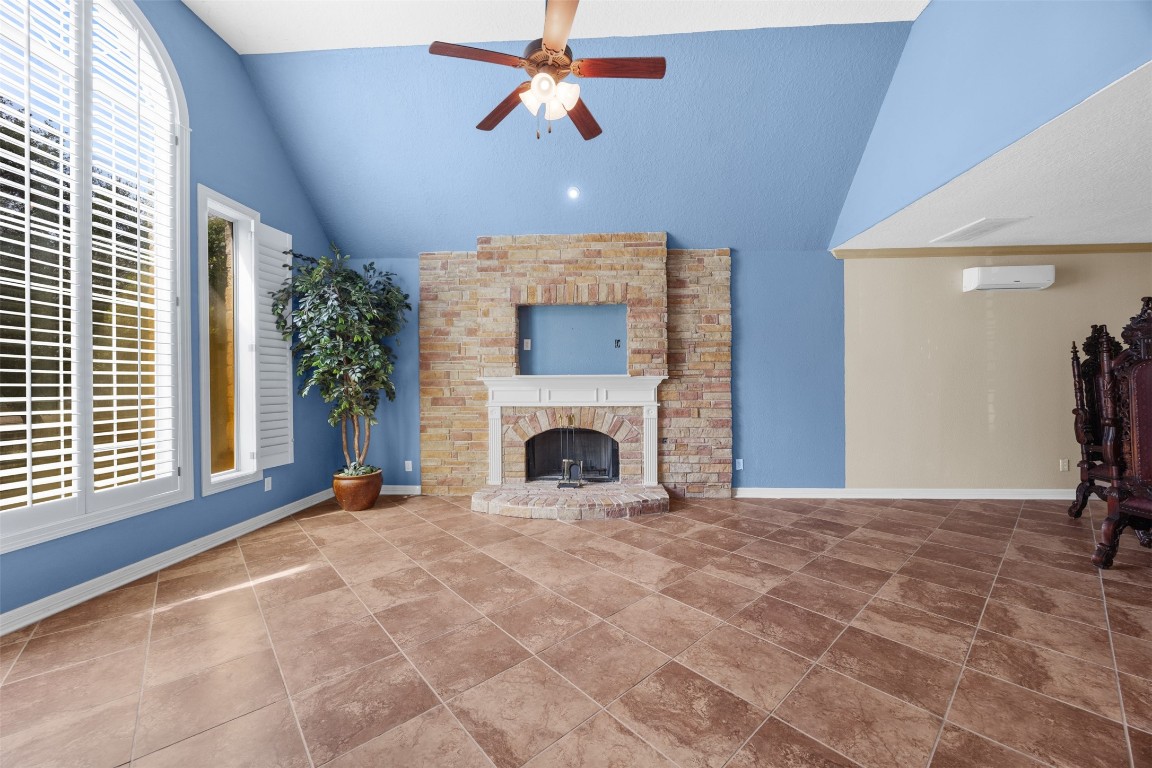 2622 Muegge Road Rosenberg, TX 77471 - Photo 7 of 35 a view of a livingroom with a fireplace and window
