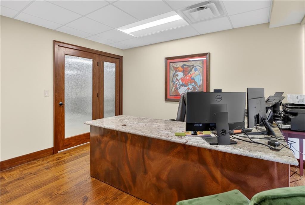 750 Washington Road Pittsburgh, PA 15228 - Photo 20 of 45 a view of a workspace with furniture and screen