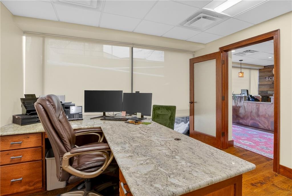 750 Washington Road Pittsburgh, PA 15228 - Photo 21 of 45 a workspace with furniture and wooden floor