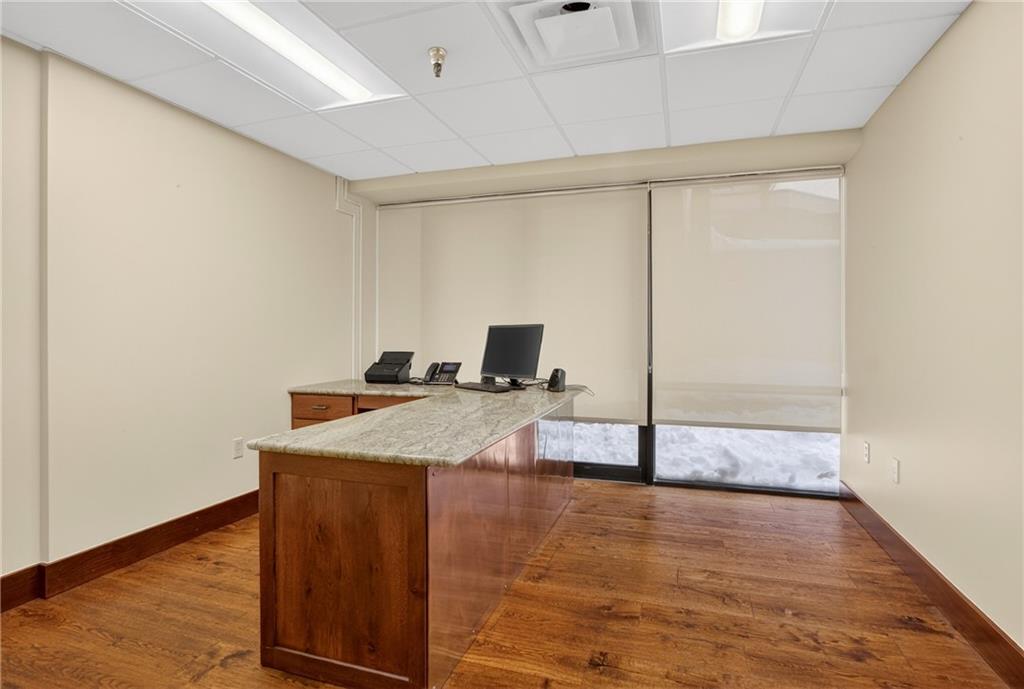 750 Washington Road Pittsburgh, PA 15228 - Photo 31 of 45 a hallway with sink and wooden floor