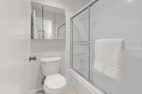 a view of house with swimming pool outdoor seating