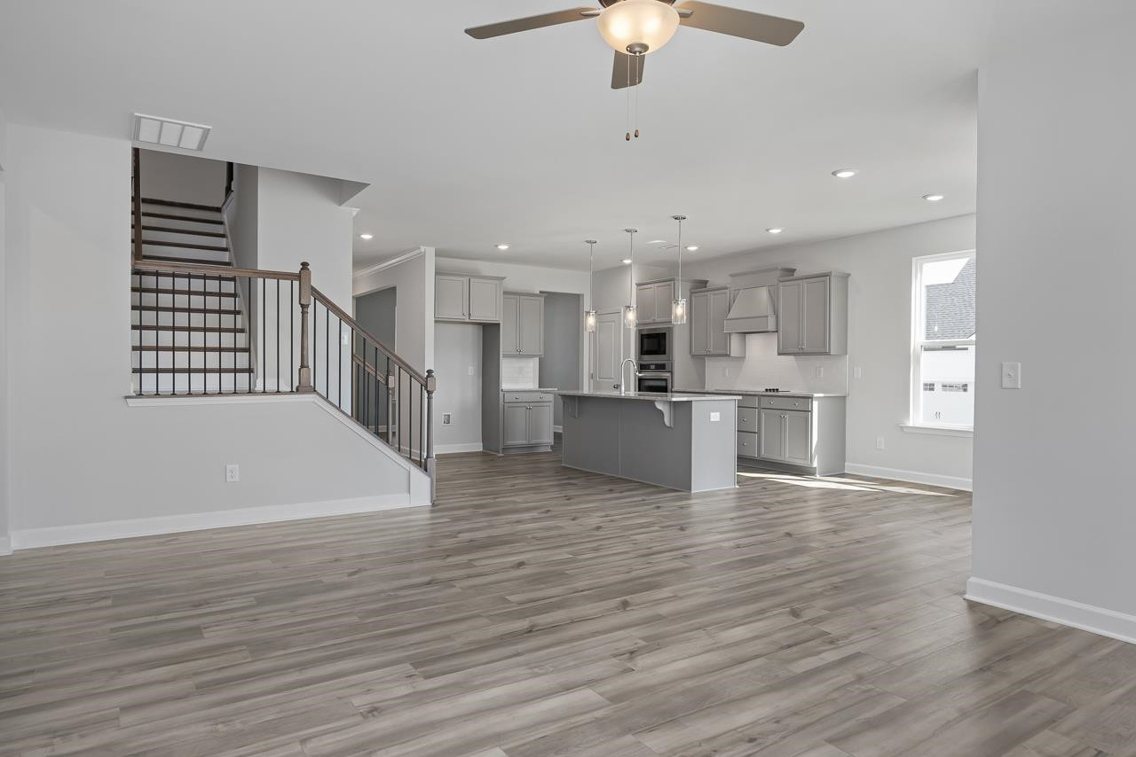 82 Morningside Lane Angier, NC 27501 - Photo 11 of 28 a view of kitchen with stove and cabinets