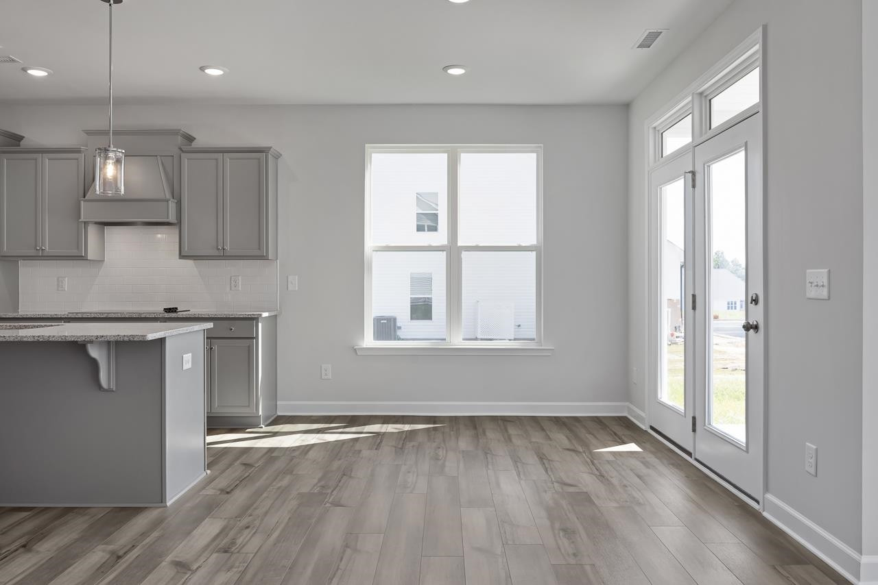 82 Morningside Lane Angier, NC 27501 - Photo 13 of 28 a view of kitchen with wooden floor and electronic appliances