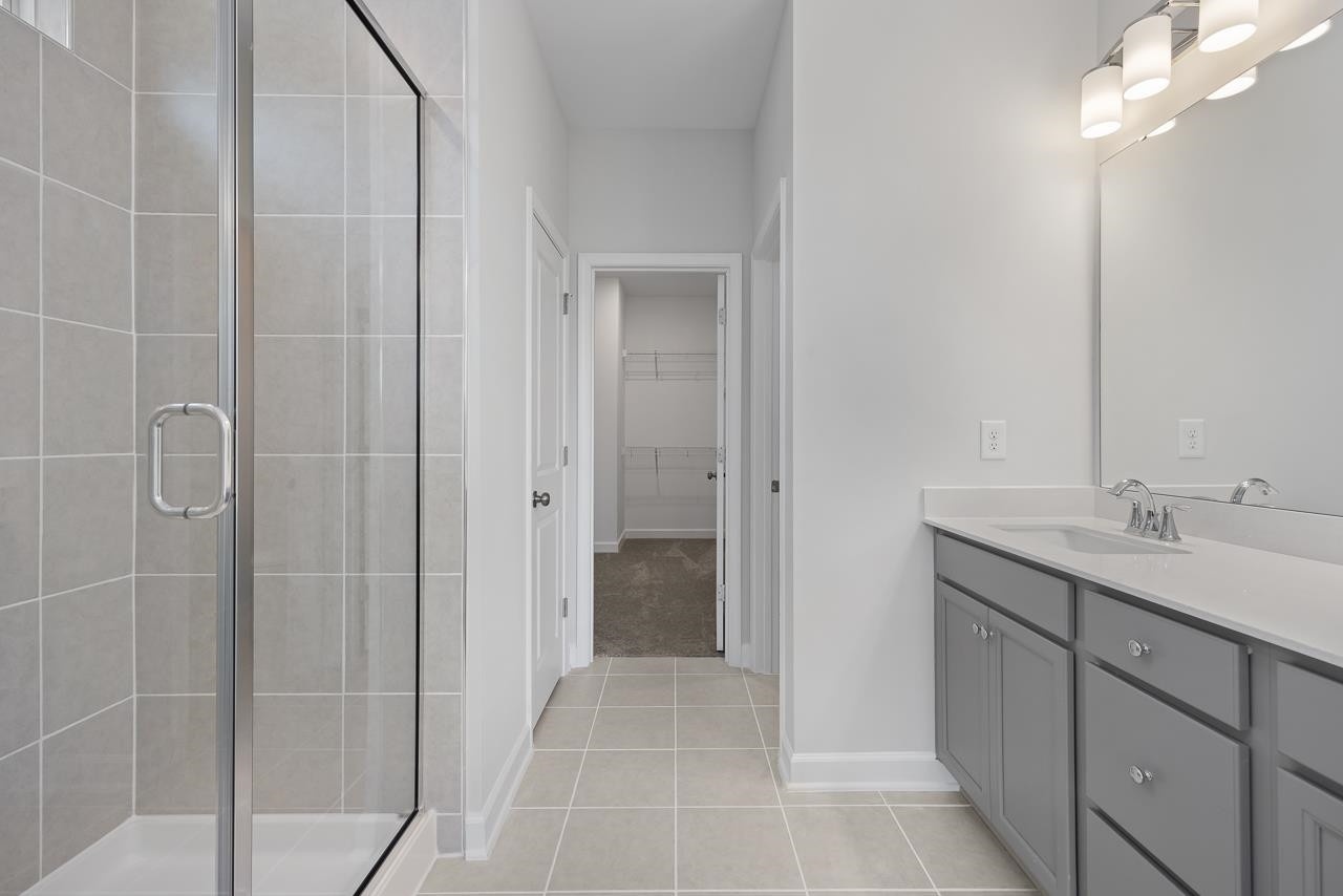 82 Morningside Lane Angier, NC 27501 - Photo 17 of 28 a bathroom with a shower and a sink