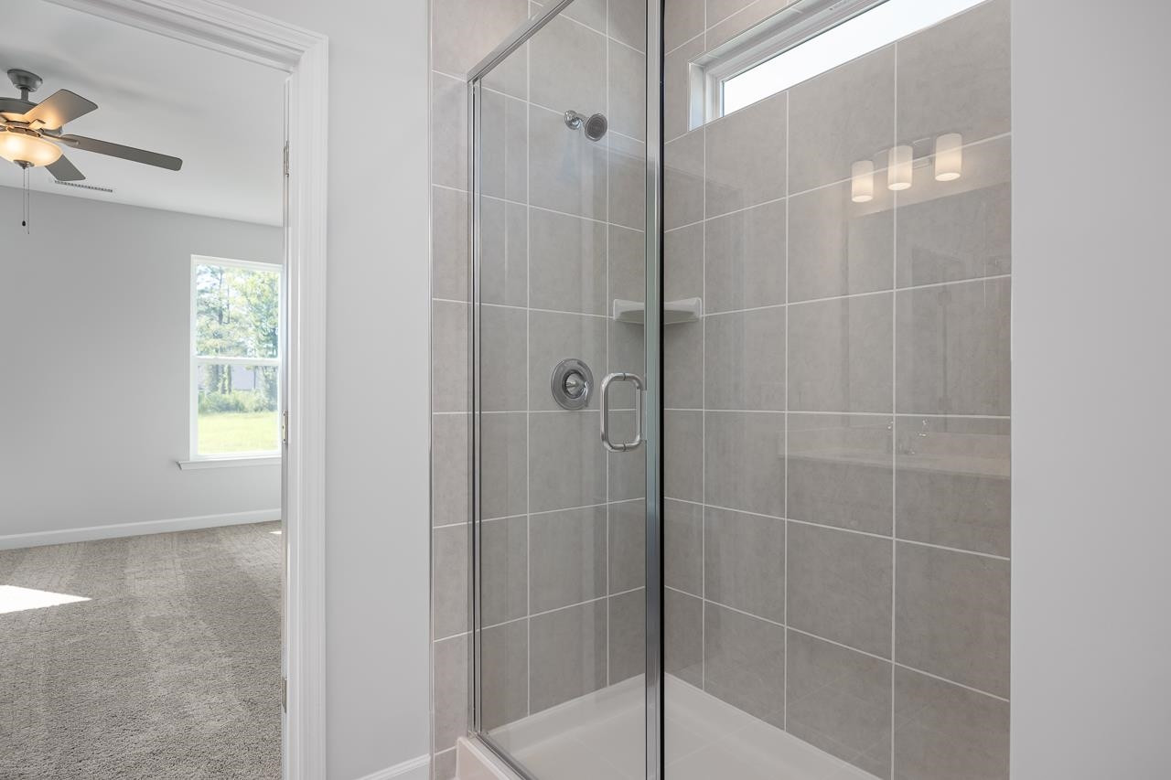 82 Morningside Lane Angier, NC 27501 - Photo 19 of 28 a bathroom with a shower