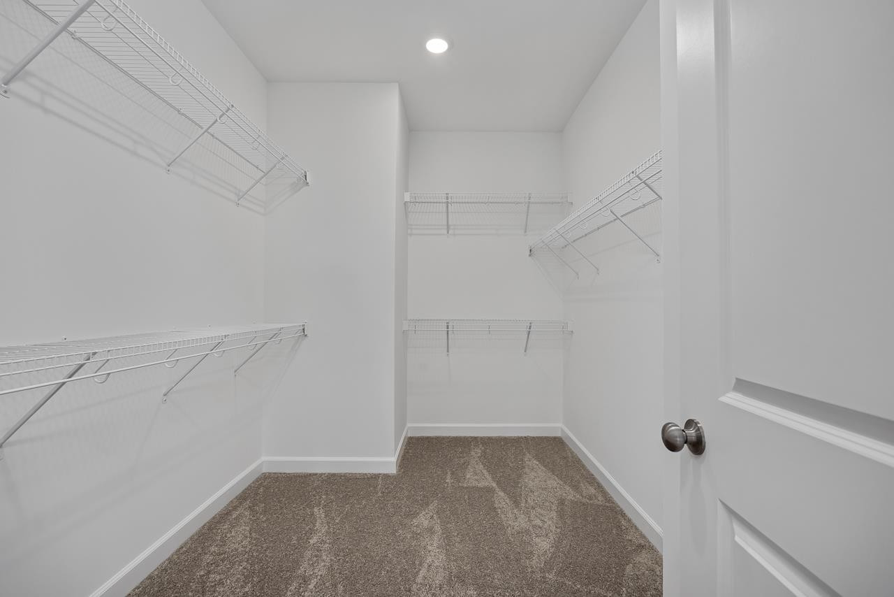 82 Morningside Lane Angier, NC 27501 - Photo 20 of 28 a view of a room with racks on the wall