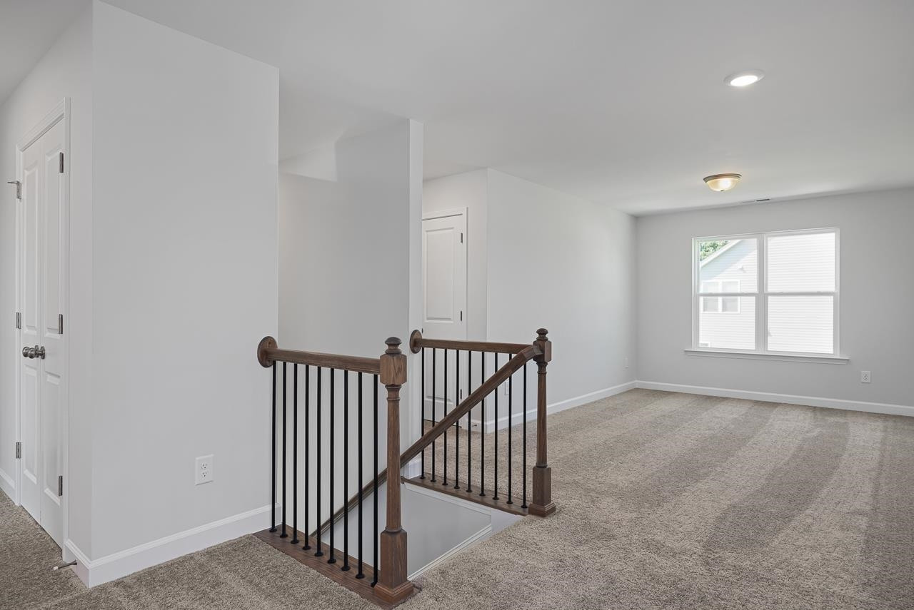 82 Morningside Lane Angier, NC 27501 - Photo 21 of 28 an empty room with windows