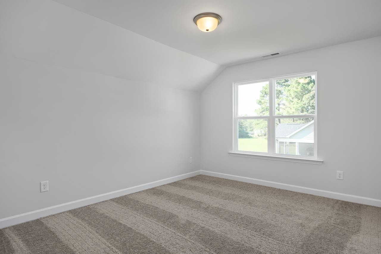 82 Morningside Lane Angier, NC 27501 - Photo 23 of 28 an empty room with a window